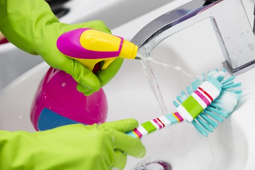 Professional cleaner working on a carpeted floor